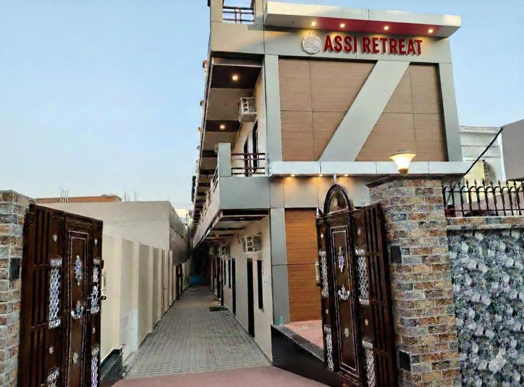 a building with a gate in front of it at Hotel Assi Retreat in Varanasi