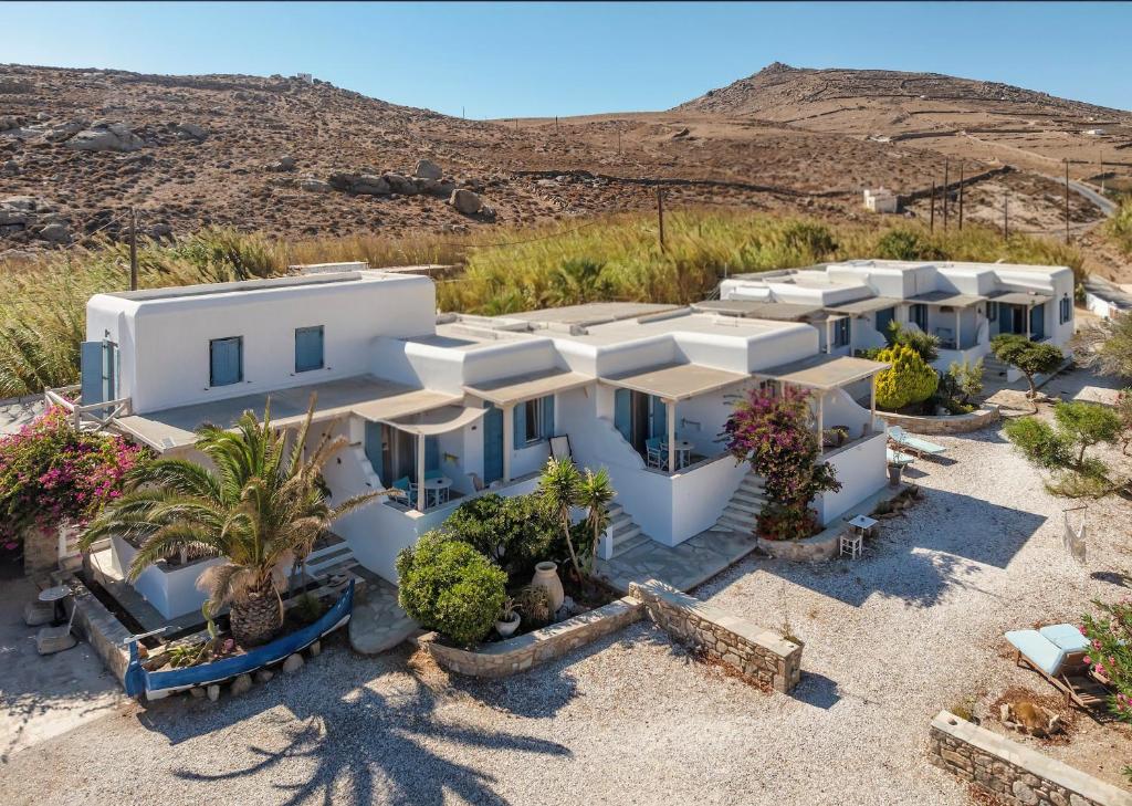 an aerial view of a white house in the desert at Bella Alba in Kalafatis