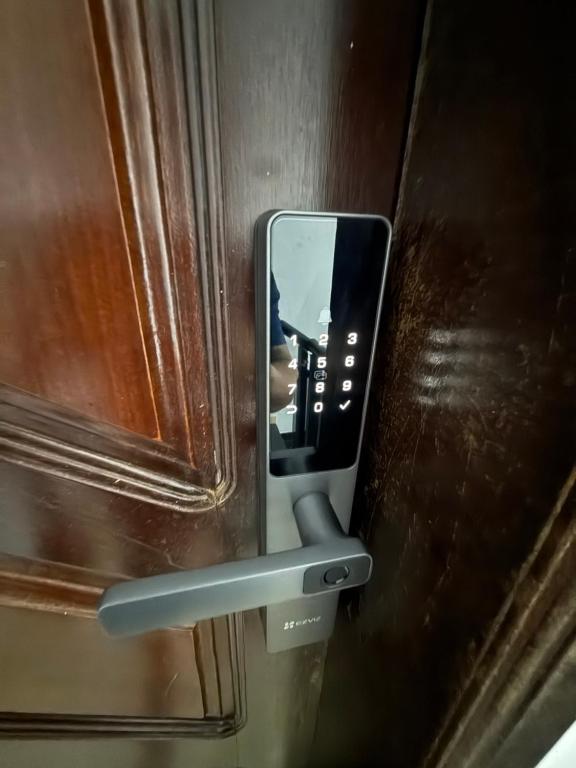 a cell phone is attached to a wall at Casa Bragança suíte in Bragança