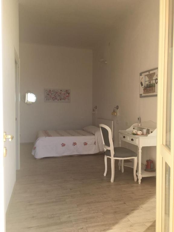 Postel nebo postele na pokoji v ubytování La Terrazza Sui Miracoli
