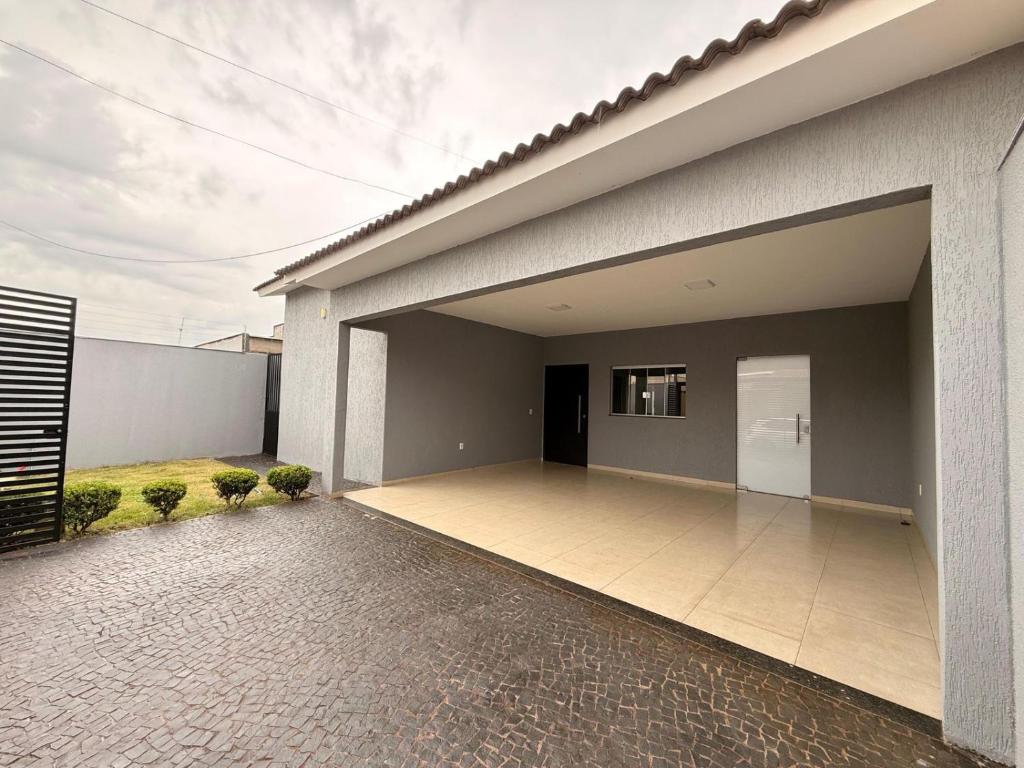 a view of a house with a patio at Casa Aconchego Lar in Rio Verde