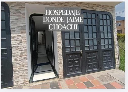 a door with a sign that readshyde dance lane chapel at Hospedaje Donde Jaime-Choachí in Choachí