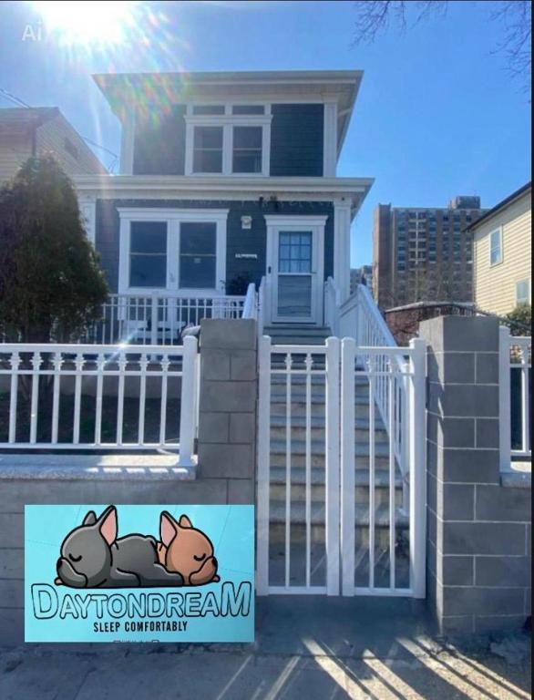 a house with a sign in front of it at Dayton Dream in Newark