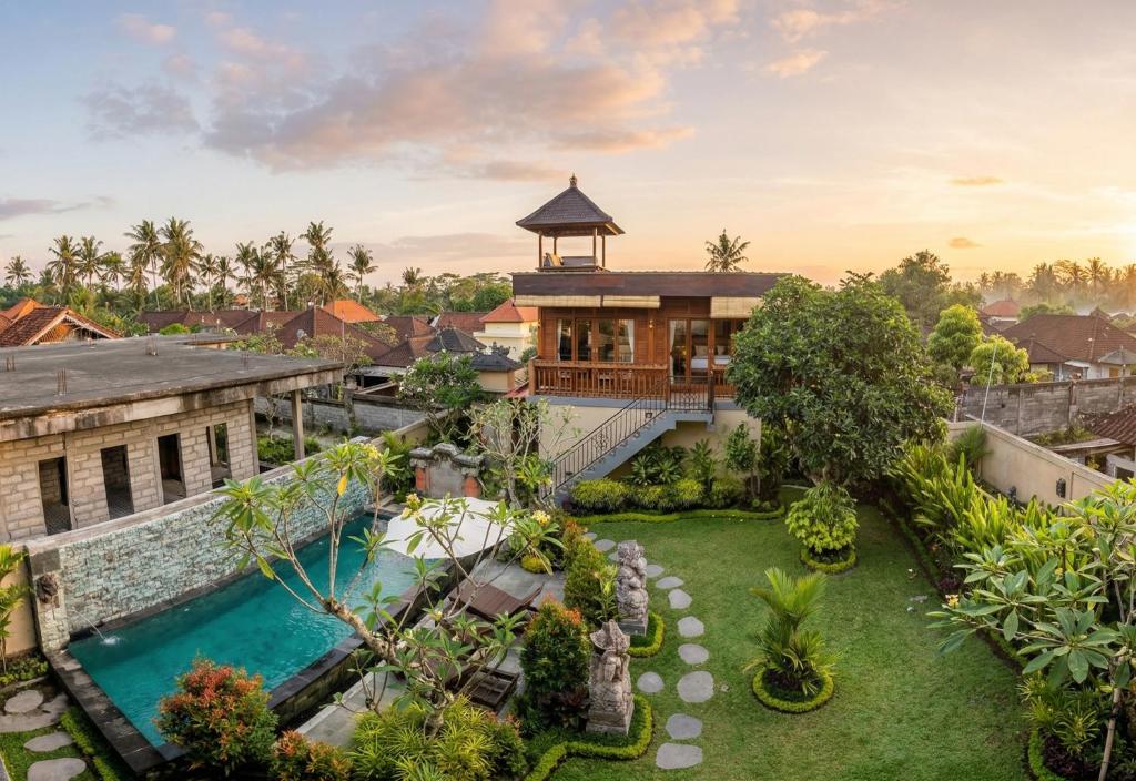 an aerial view of a resort with a swimming pool at Sari Murni in Ubud