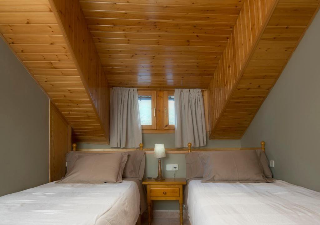 Postel nebo postele na pokoji v ubytování Casa Sastre