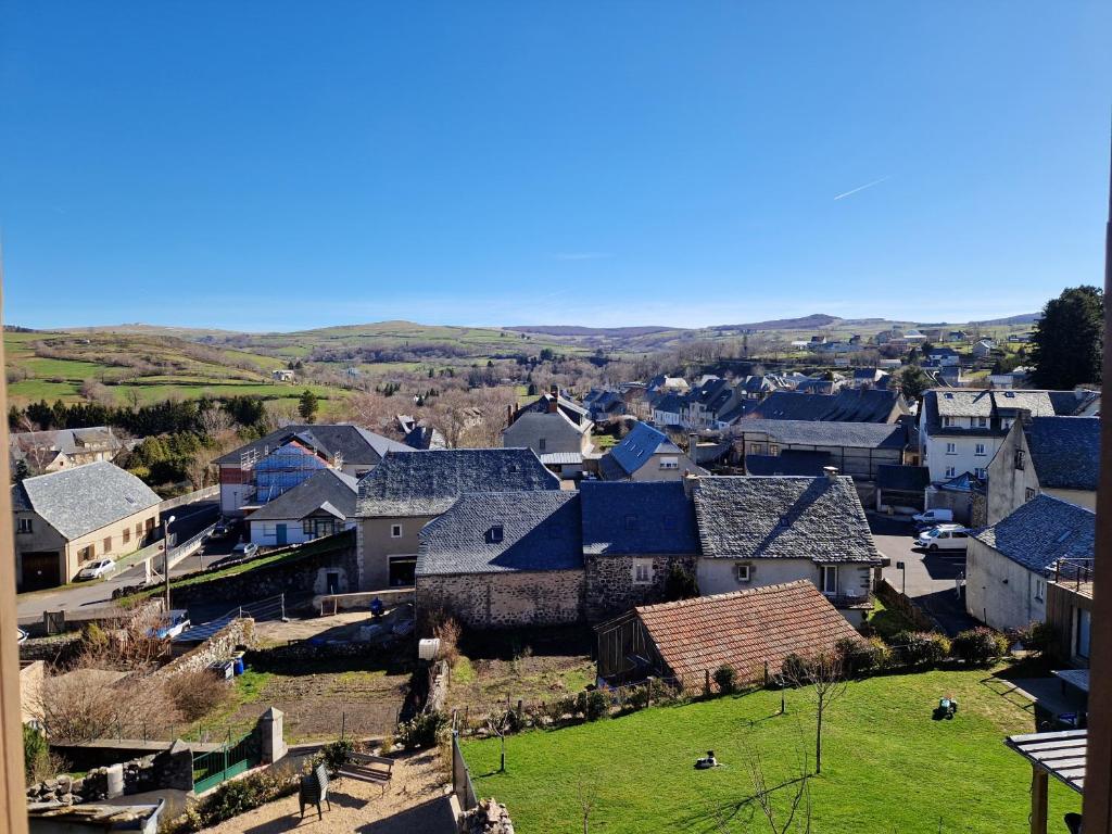 an aerial view of a village with houses at Les Terrasses de Laguiole in Laguiole