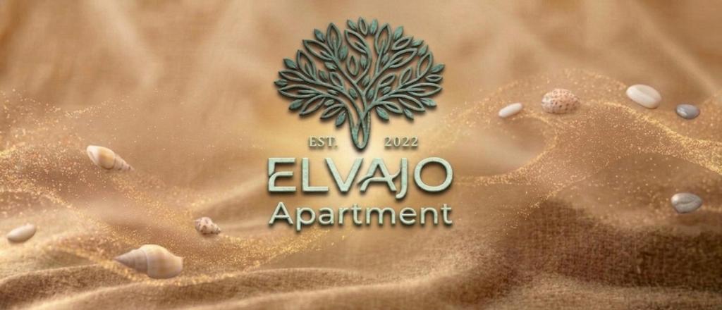 a logo for the environmental agency evoarmaarmaarmaowment in the sand at ELVAJO Apartment in Zacharo