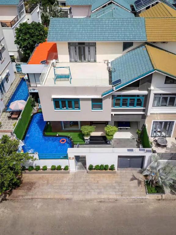 an aerial view of a house with a swimming pool at Villa B2-10 Long Cung in Vung Tau
