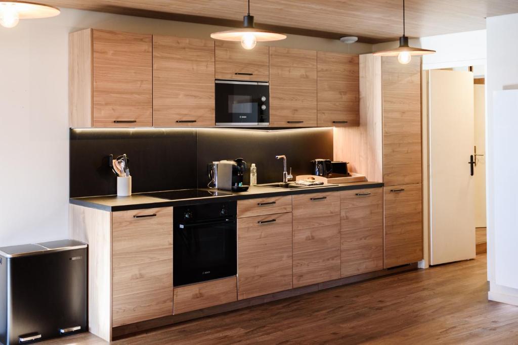 Résidence Alpina Lodge - Three-Bedroom Apartment With View