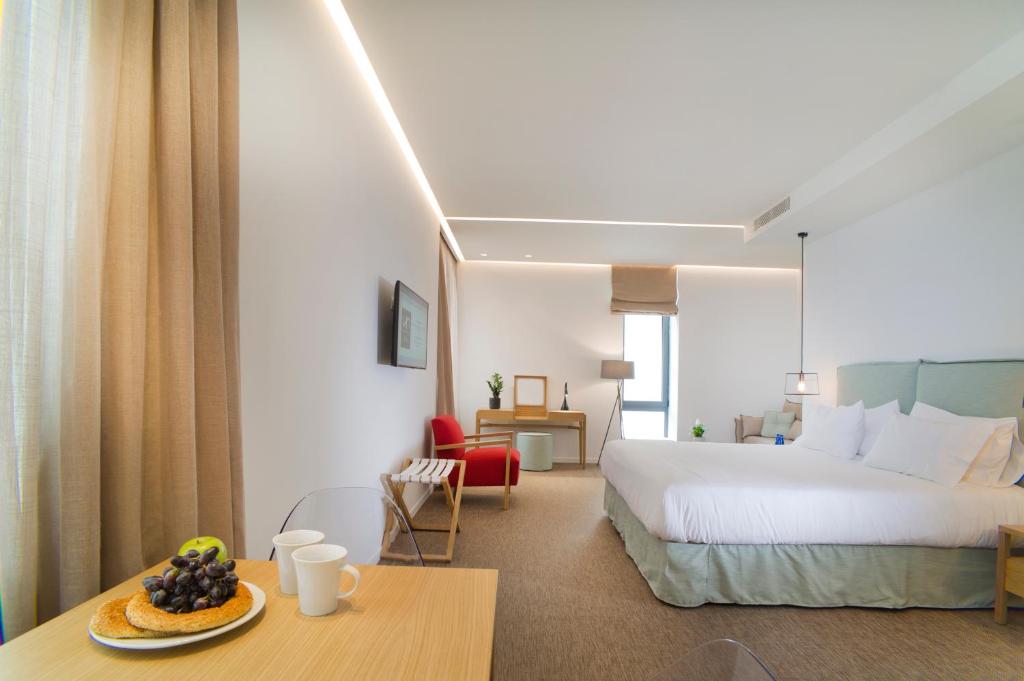 Posteľ alebo postele v izbe v ubytovaní NLH FIX | Neighborhood Lifestyle Hotels