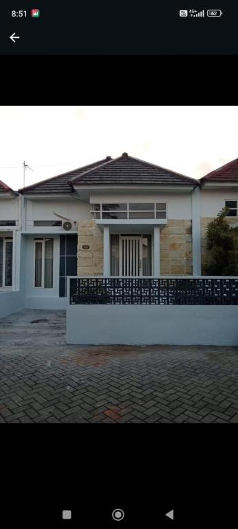 a picture of a house with aoice at Gallendra Villa in Karangploso