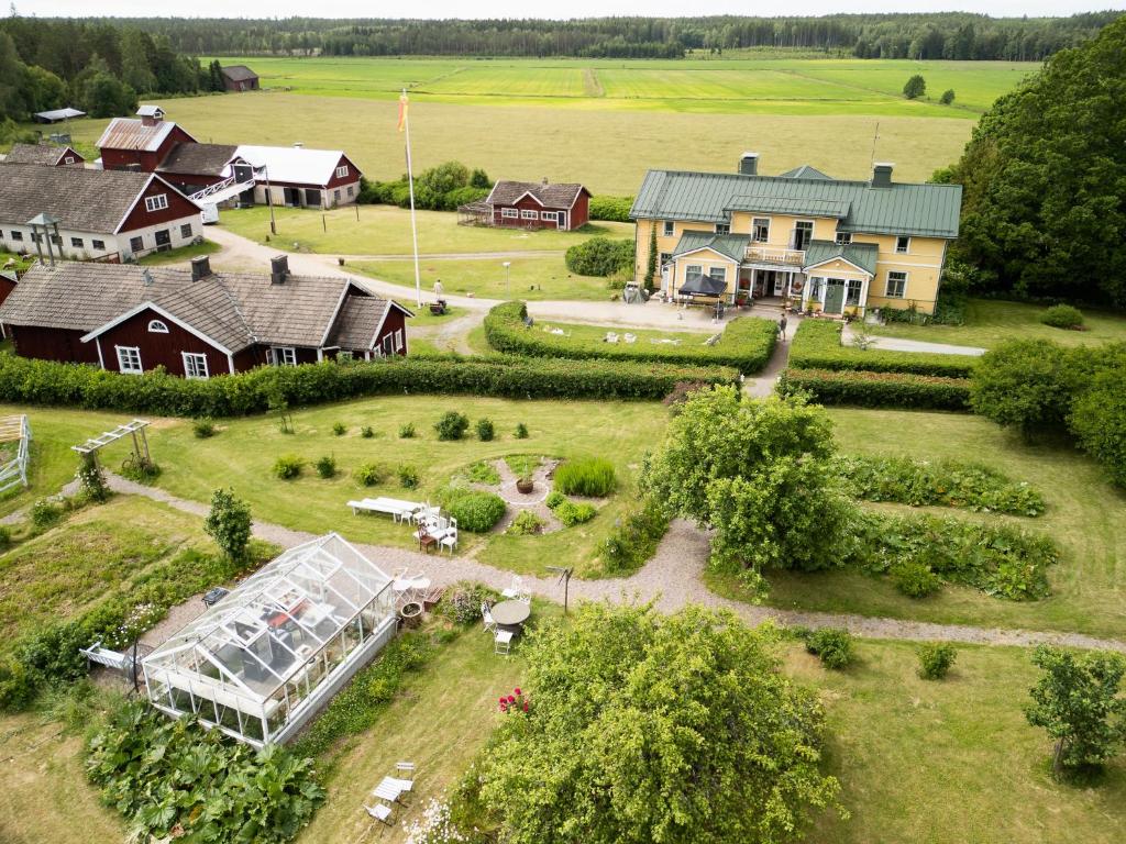 an aerial view of a house with a garden at Kansjerf Gård in Bromary