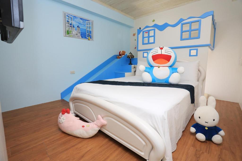 Postel nebo postele na pokoji v ubytování Yilan Homeland B&B