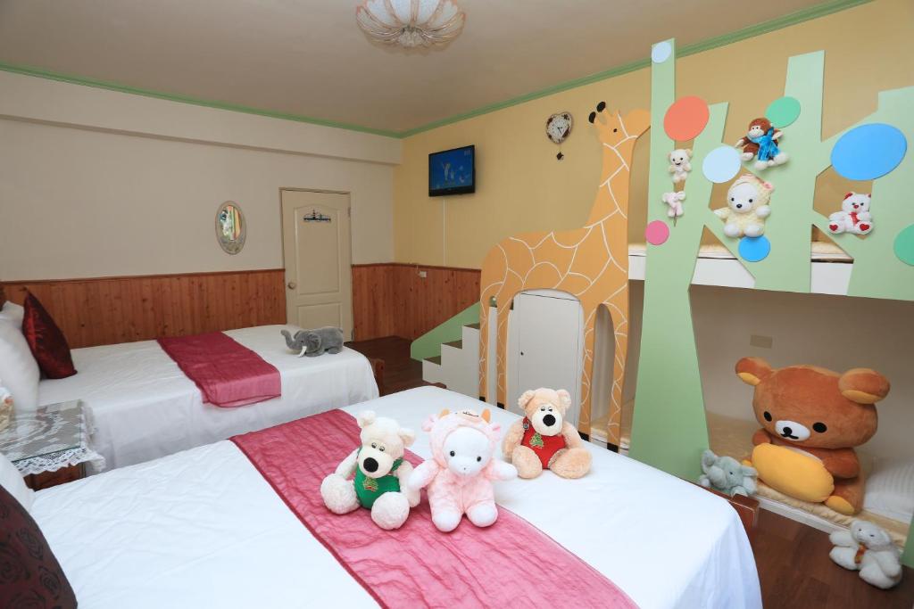 Postel nebo postele na pokoji v ubytování Yilan Homeland B&B