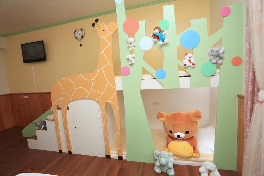 Postel nebo postele na pokoji v ubytování Yilan Homeland B&B