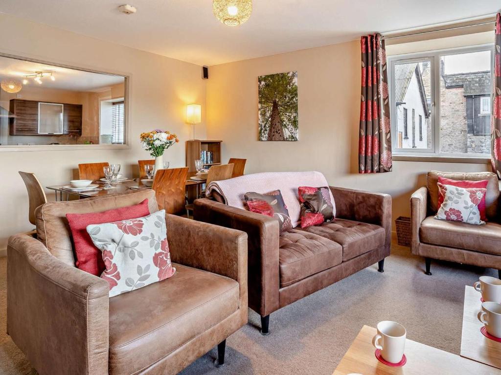 a living room with two chairs and a couch at 3 Bed in Brecon oc-bn304 in Brecon