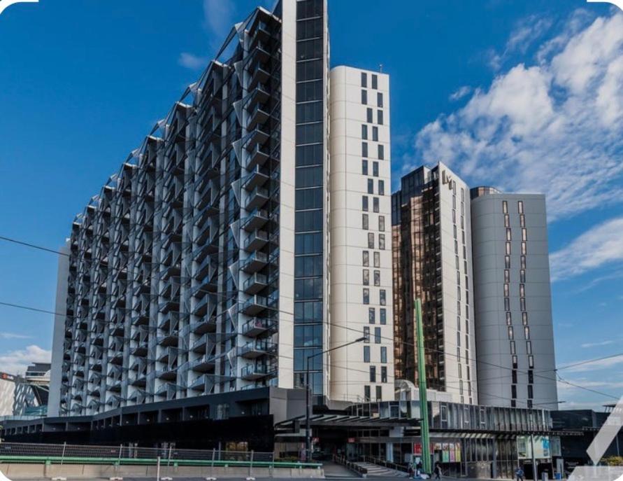 a large white building with many windows at Harbour Haven Sleep 7 Free Parking Free Tram to CBD in Melbourne