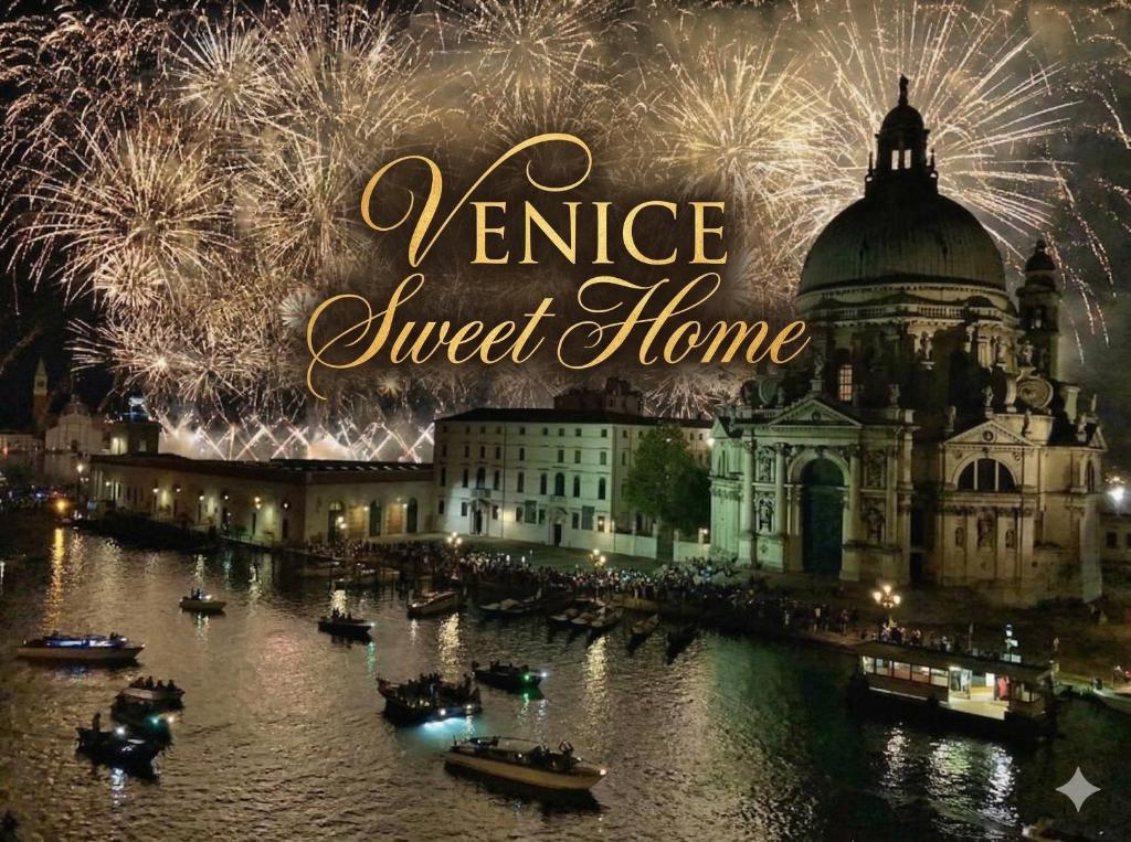 a view of a building with fireworks over a river at VENICE Sweet Home - your home in a beautiful neighborhood of the City of Venice in Favaro Veneto