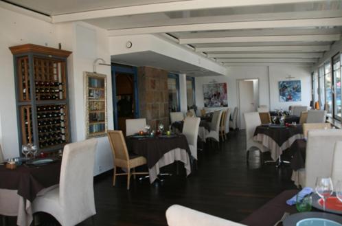 Posezení v ubytování Hotel Le Suroit
