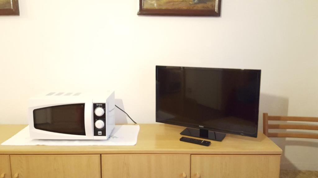 TV a/nebo společenská místnost v ubytování Cèsa Silvano