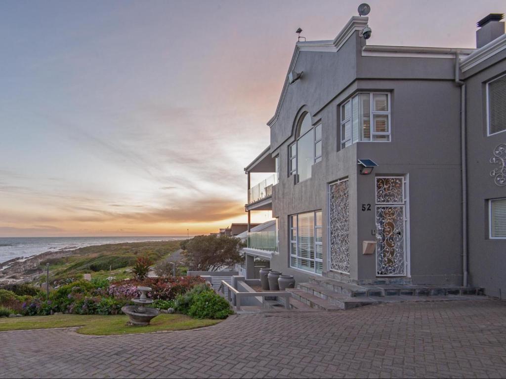 a house with a view of the ocean at Absolute Ocean Boutique Guesthouse in Hermanus