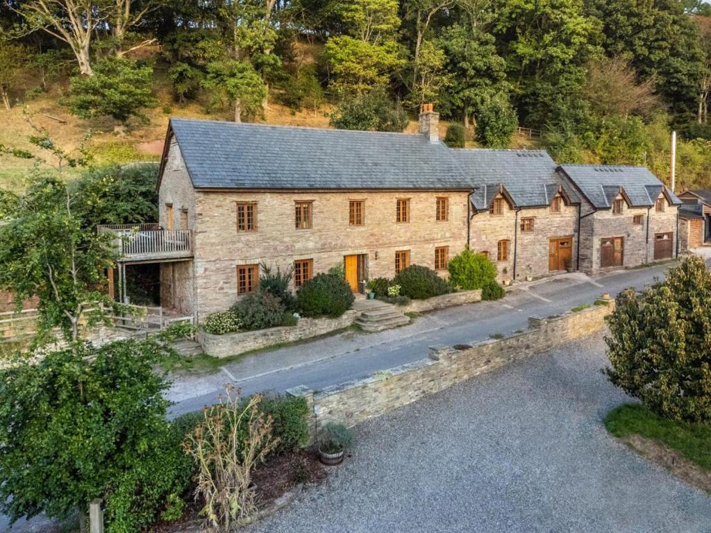 an aerial view of a house with a driveway at 8 Bed in Llanigon oc-bn241 in Llanigon