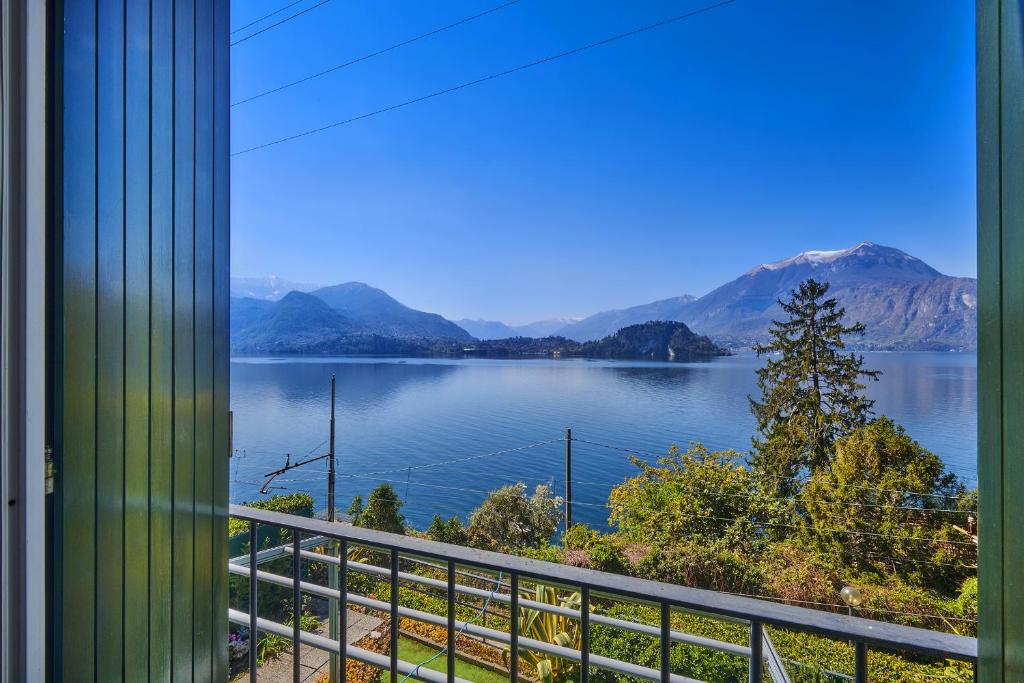 a view of a lake from a balcony at Bella Vista in Varenna