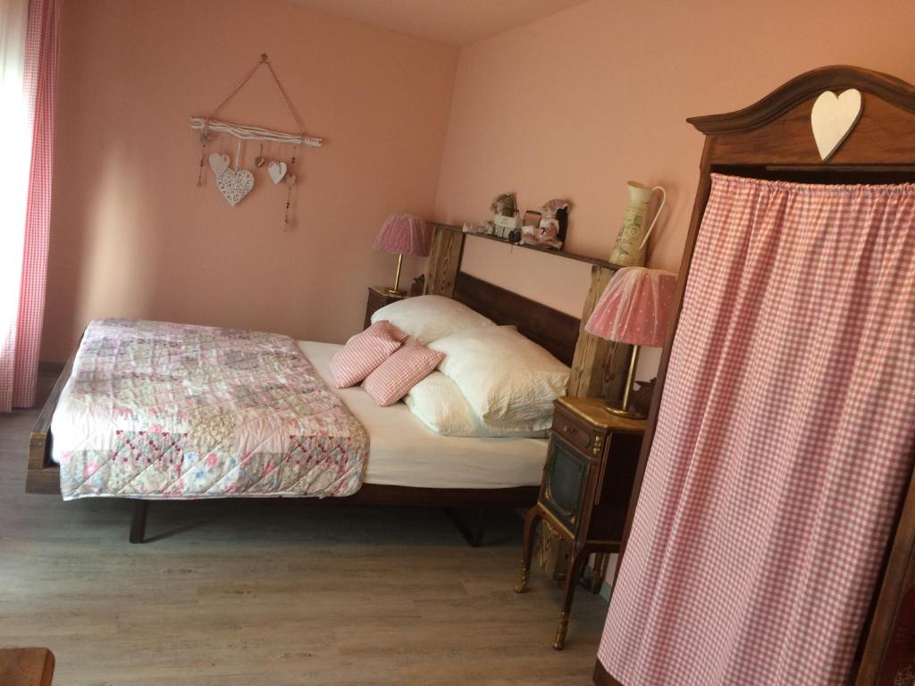 Postel nebo postele na pokoji v ubytování B&B Friedau