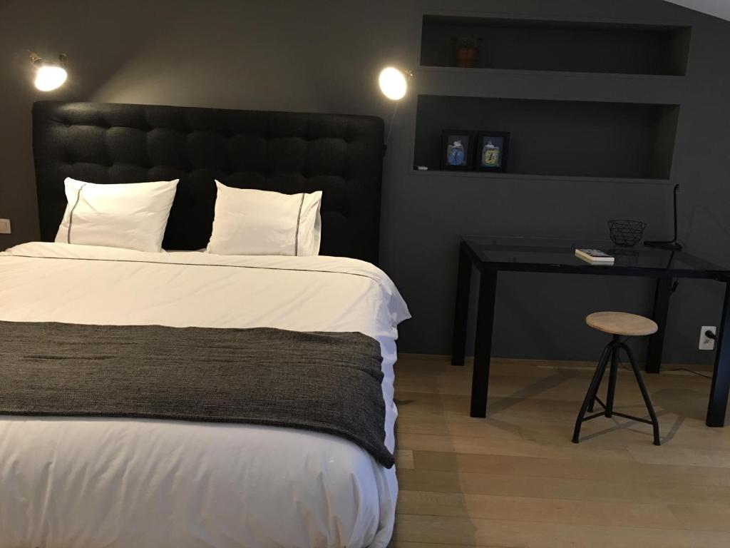 Postel nebo postele na pokoji v ubytování Atelier n°5