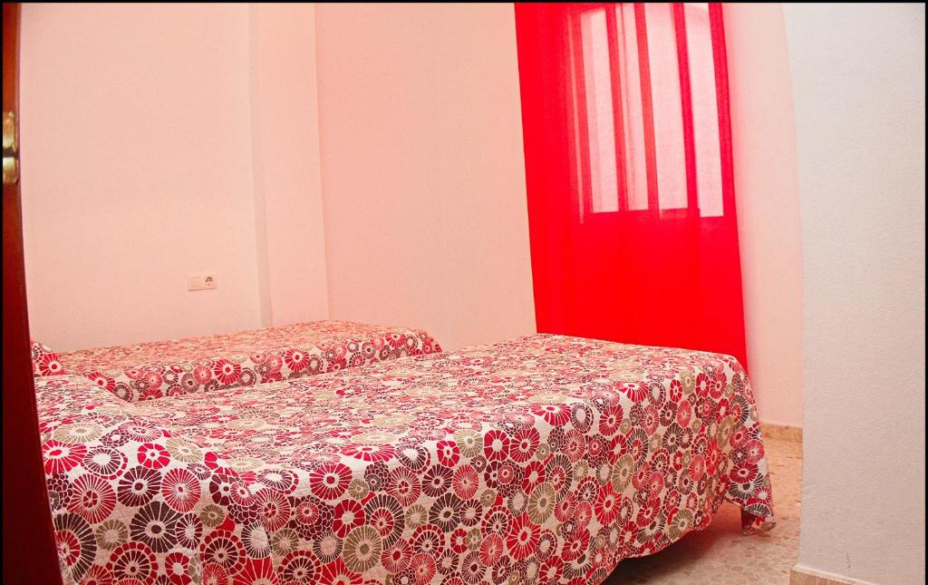 Posteľ alebo postele v izbe v ubytovaní Apartamento Centro Tonelero II