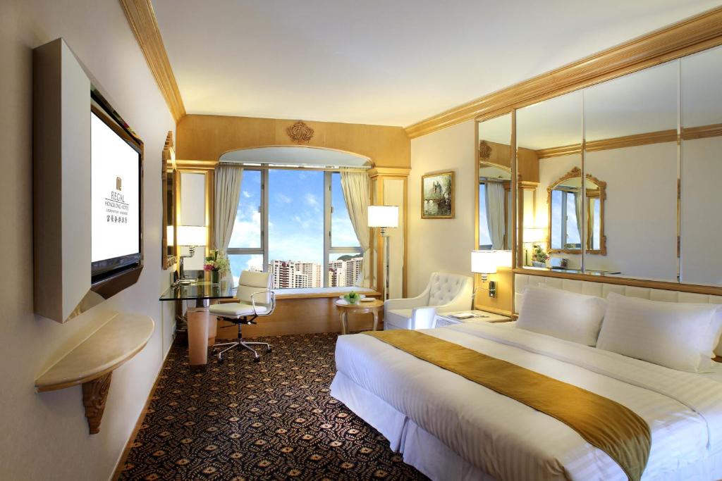 Voodi või voodid majutusasutuse Regal Hongkong Hotel toas