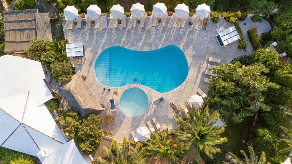 an overhead view of a swimming pool at a resort at Hotel Balocco in Porto Cervo