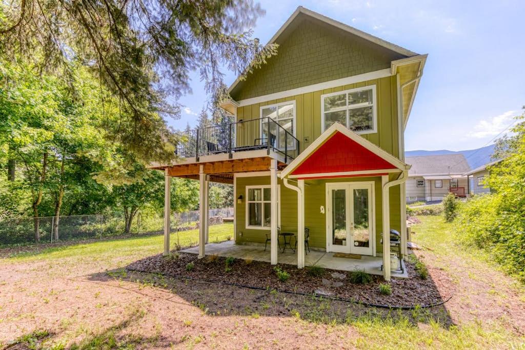 a small yellow house with a red roof at Dog-friendly studio with river view patio grill & shared W&D in Stevenson