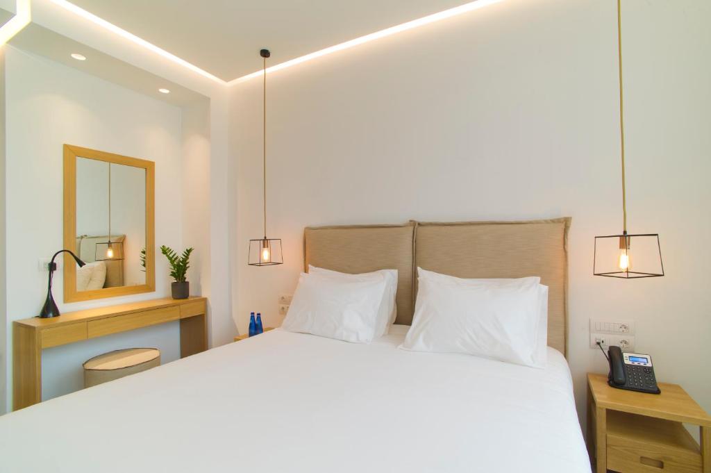 Posteľ alebo postele v izbe v ubytovaní NLH FIX | Neighborhood Lifestyle Hotels