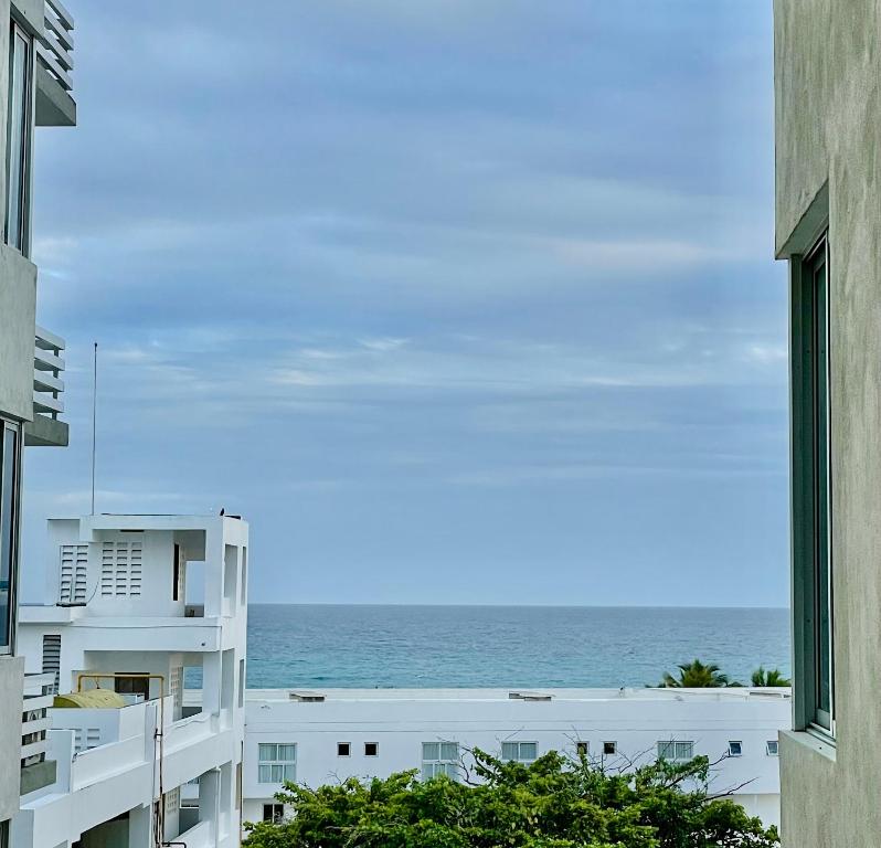 a view of the ocean from a building at Vista Marina Boca Chica in Boca Chica
