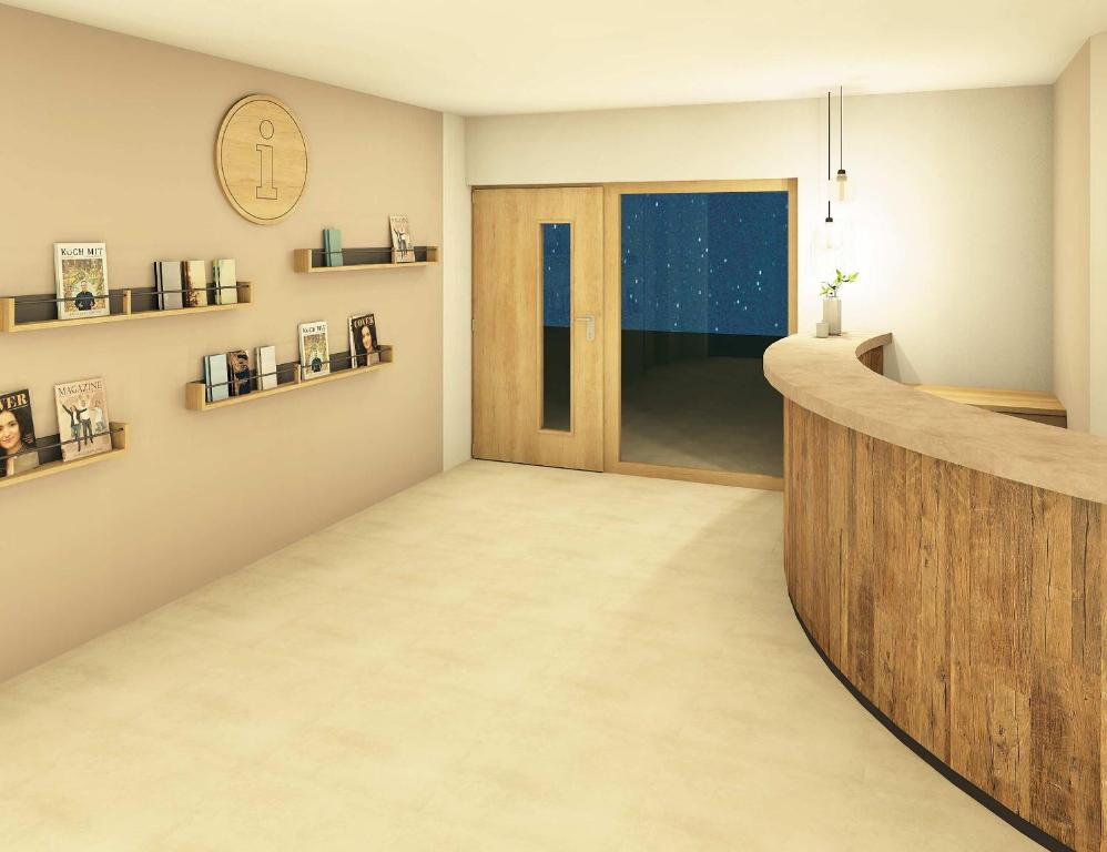 a living room with a hallway with a wooden door at Landhaus Lengg in Reit im Winkl