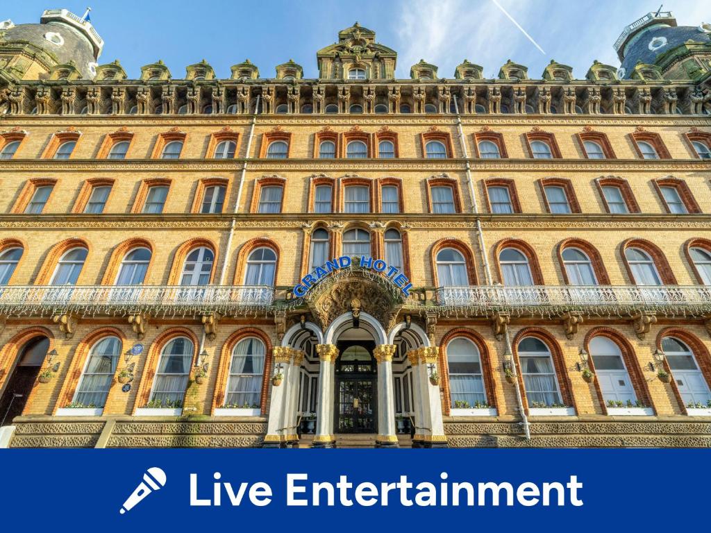 a large building with the words live entertainment at The Grand Scarborough in Scarborough