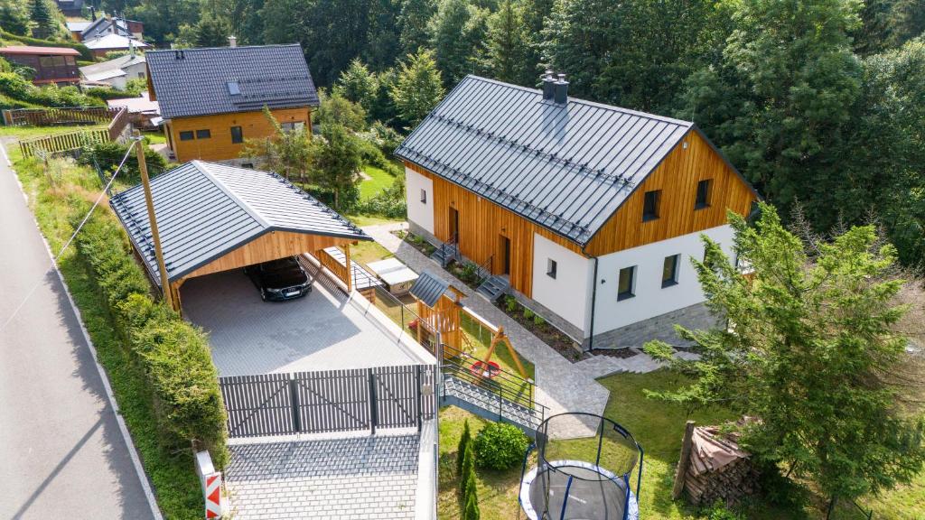 an aerial view of a house with a garage at Wellness chata Kouty in Loučná nad Desnou
