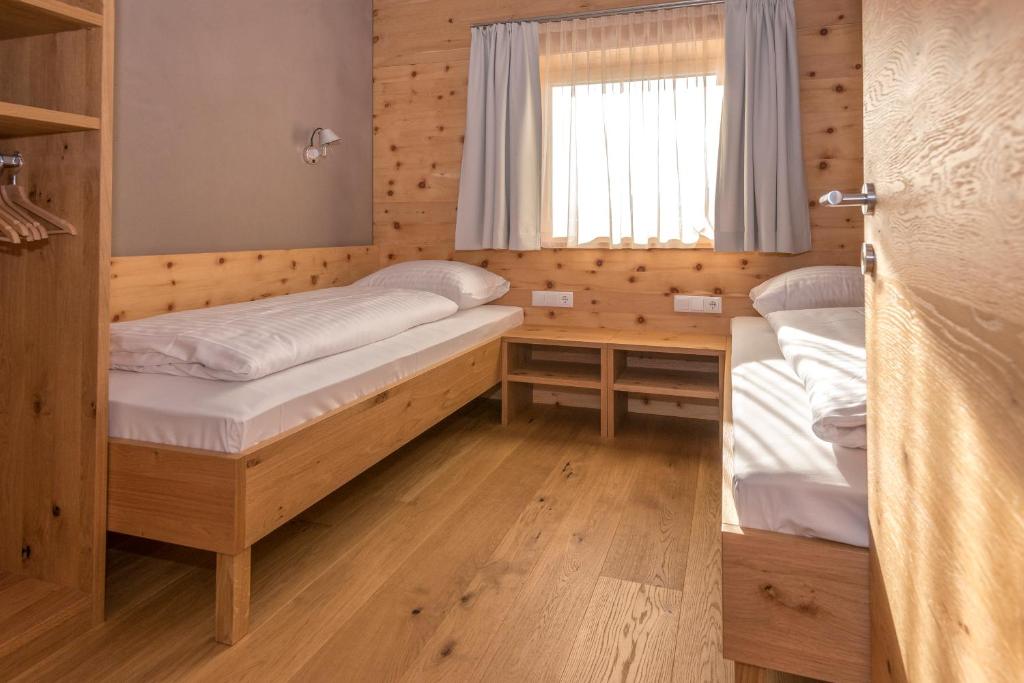 Postel nebo postele na pokoji v ubytování Atelier Ronacher