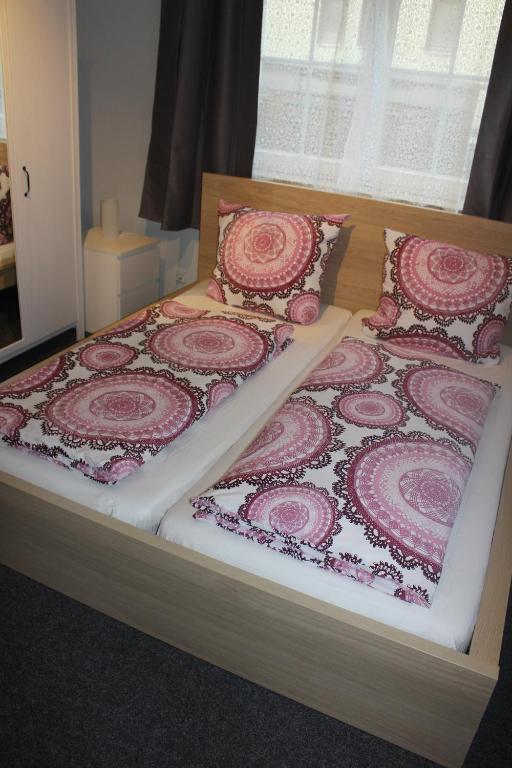 Postel nebo postele na pokoji v ubytování Bismarck Hostel Öhringen