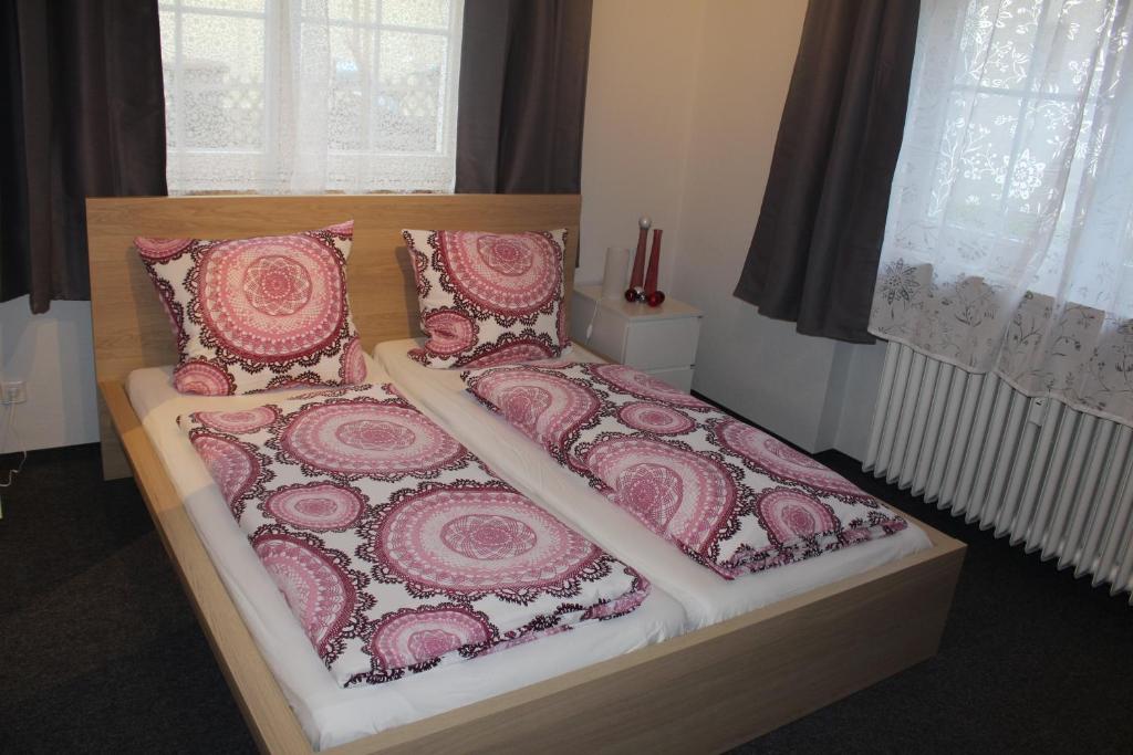 Postel nebo postele na pokoji v ubytování Bismarck Hostel Öhringen