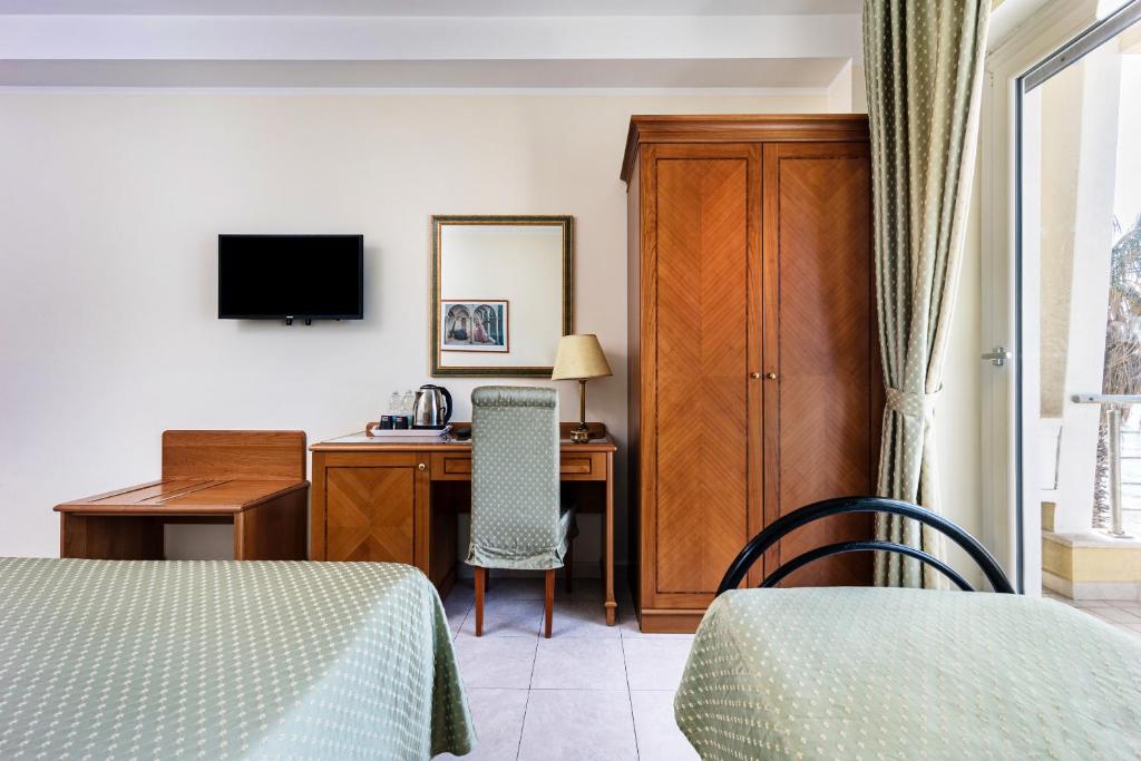 Grand Hotel Victoria - Habitación Cuádruple