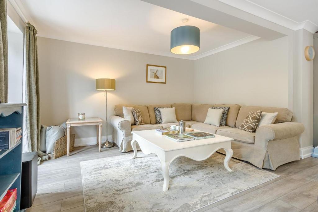 a living room with a couch and a table at 3 Bed in Knapton oc-1191 in Knapton