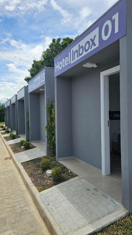 a building with a hilton inbox sign on it at Hotel In Box - Roseira in Roseira