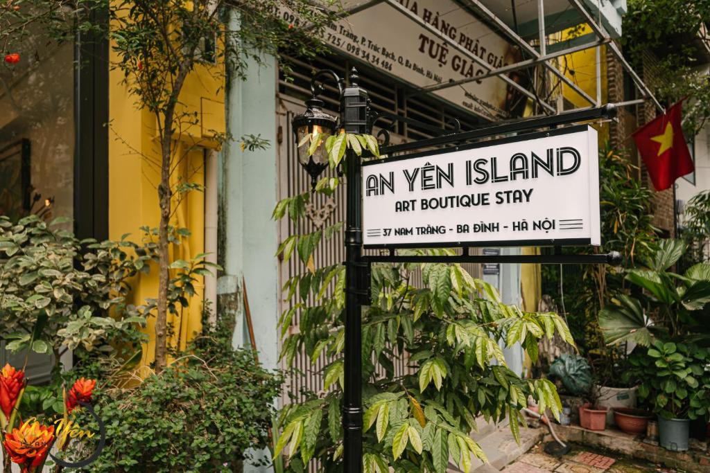 a sign that reads an unnamed island for boutiquestay at An Yên Island - Art Boutique Stay with Dual Lake view in Hanoi