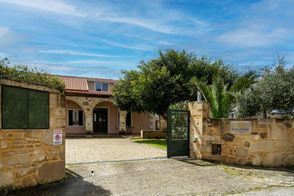 Detached villa exterior with garden