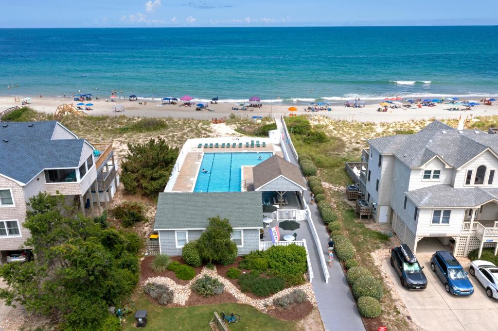 an aerial view of homes and the beach at Sandcastle in Corolla