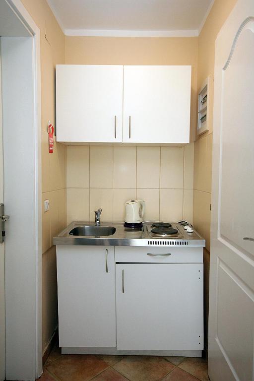Kuchyň nebo kuchyňský kout v ubytování Apartments Villa Mare Mar