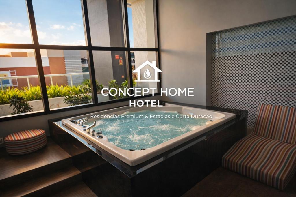 a jacuzzi tub in a hotel room at Astron Mundial luxo Concept in Salvador