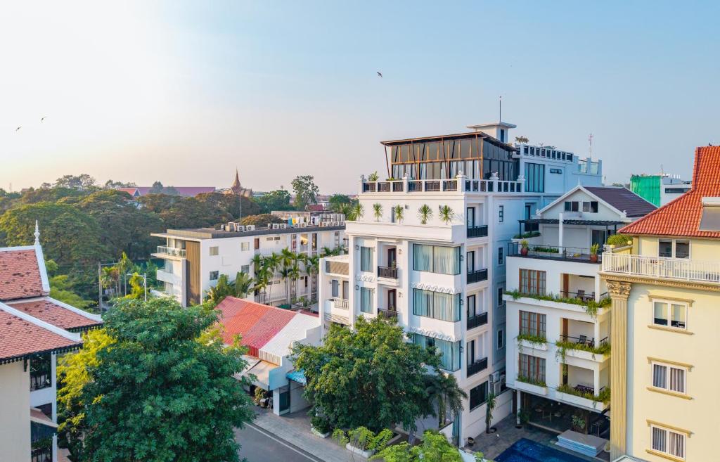 an overhead view of a city with buildings at Homewood Hotel Siem Reap in Siem Reap